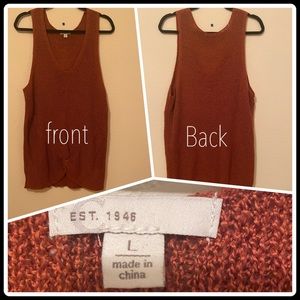 It’s a Cato brand tank top with a knitting feel. It’s a size large.